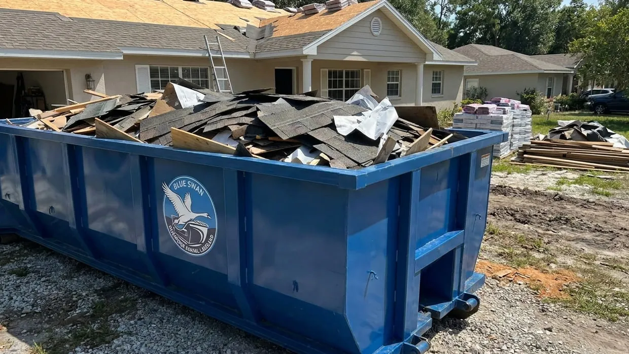 Roofing tear-off dumpster sizing in Lakeland, Florida — shingle layers loaded flat by weight, not by volume Roofing tear-off dumpster sizing in Lakeland, Florida — shingle layers loaded flat by weight, not by volume